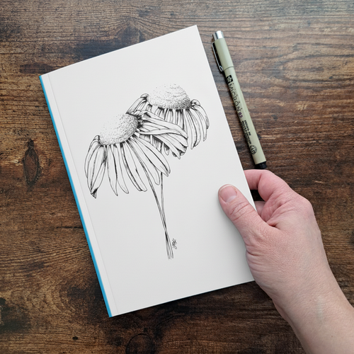 Coneflowers in Ink Journal — Hand Mockup